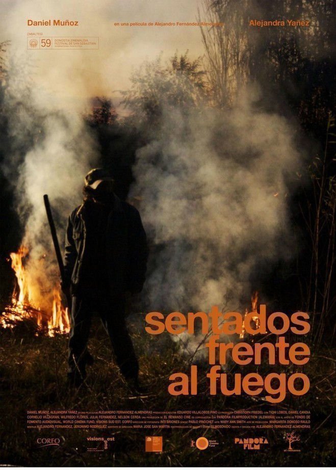 Sentados frente al fuego - Poster